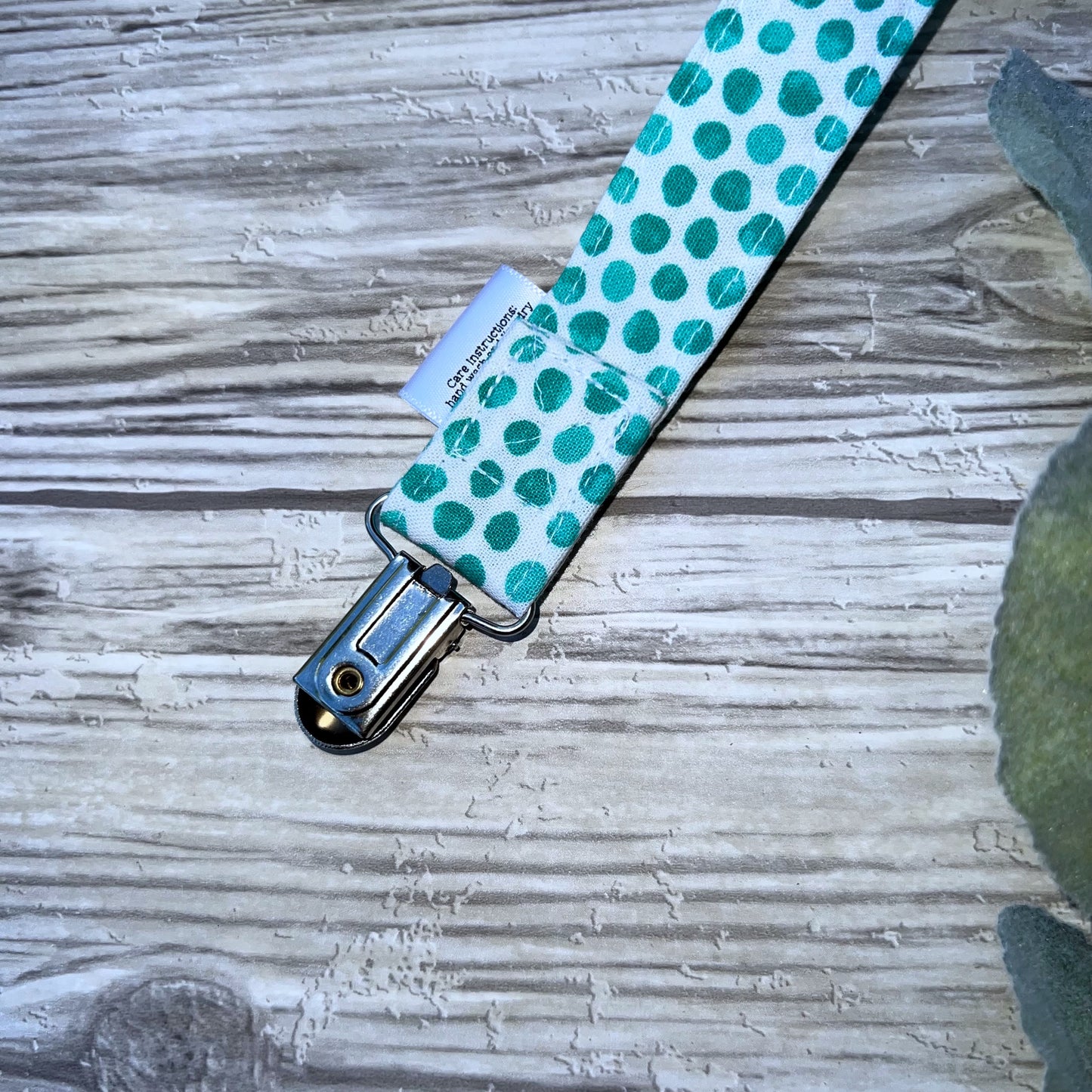 Aqua Dots on White Pacifier Clip